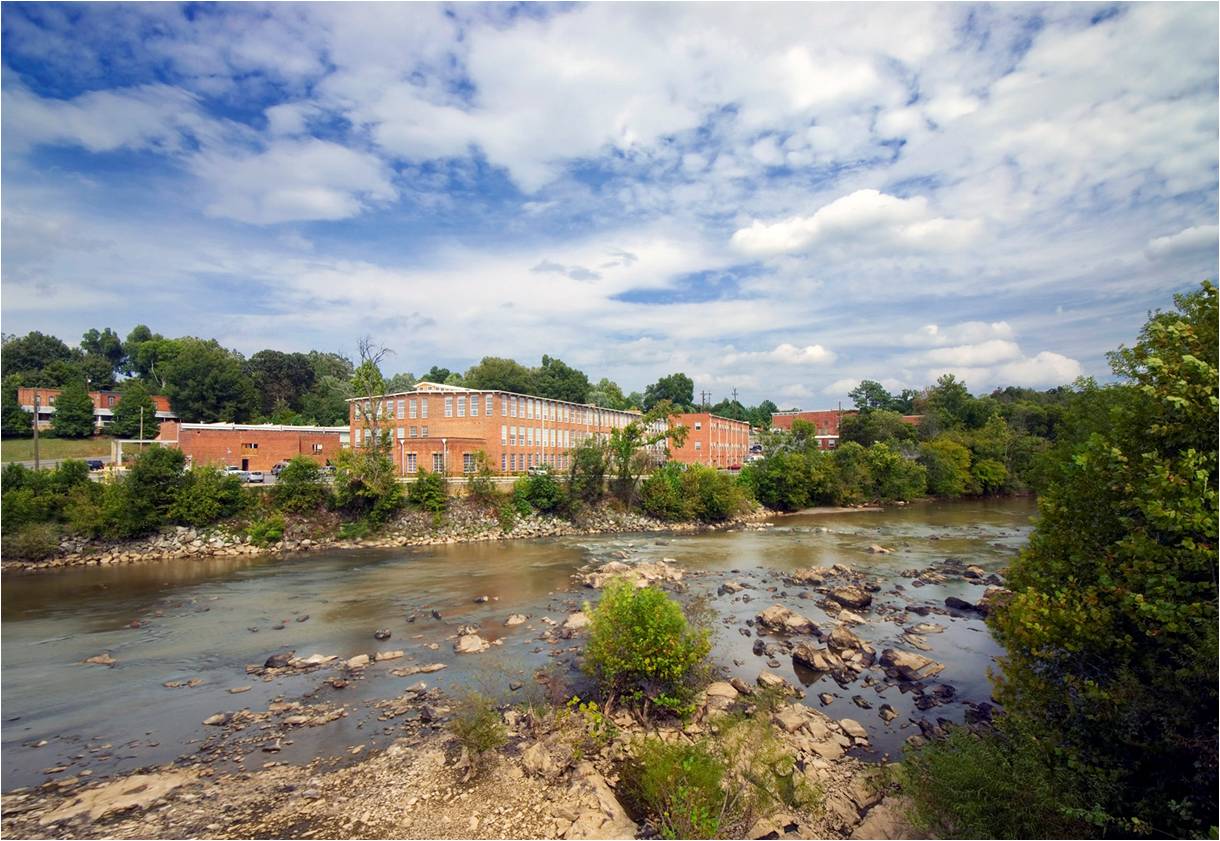 Hawbridge Lower and Upper School campuses along the Haw River.