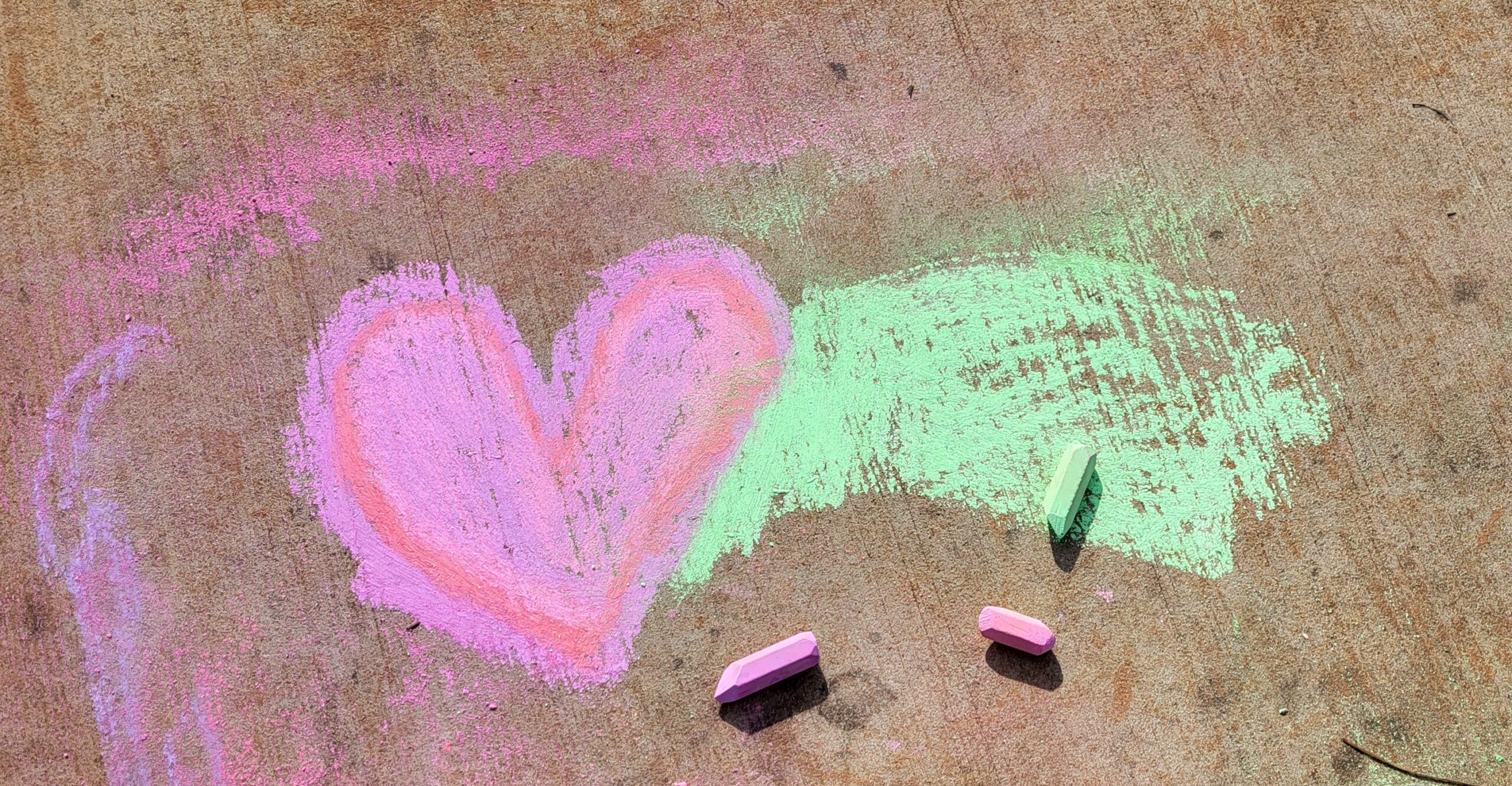 Colorful chalk artwork created outdoors at Hawbridge