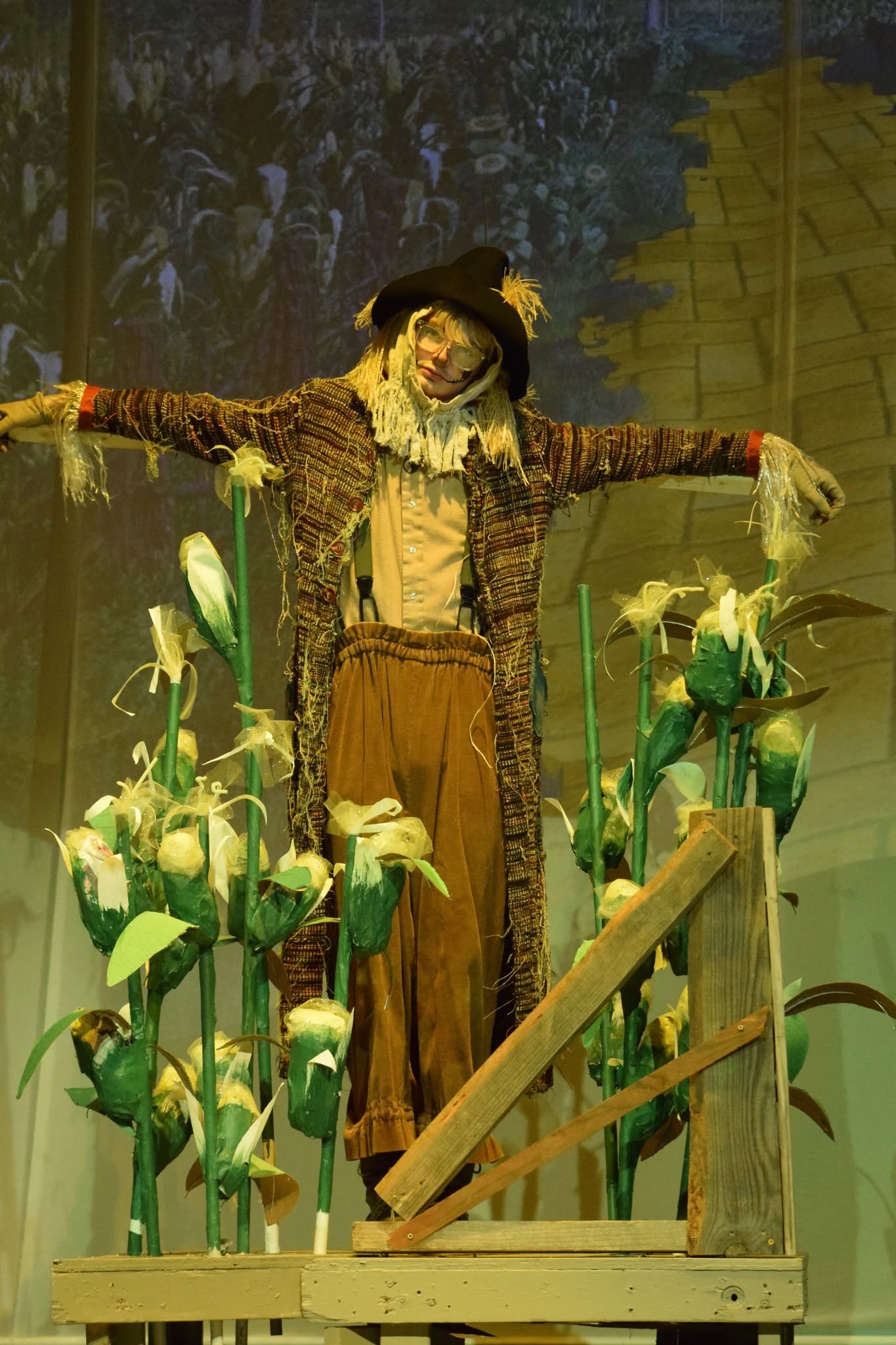 Student performing as the Scarecrow in Hawbridge’s production of The Wizard of Oz.