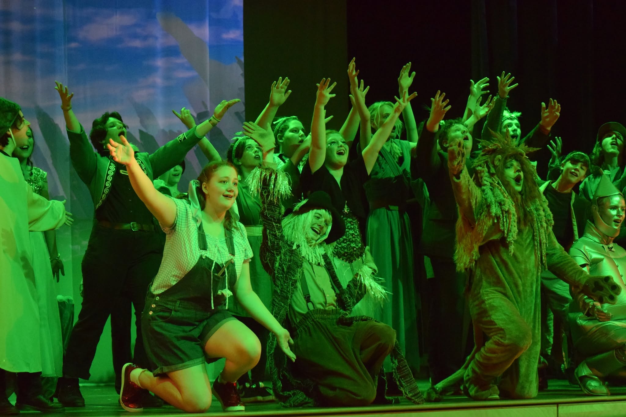 Cast members performing together in Hawbridge’s production of The Wizard of Oz.